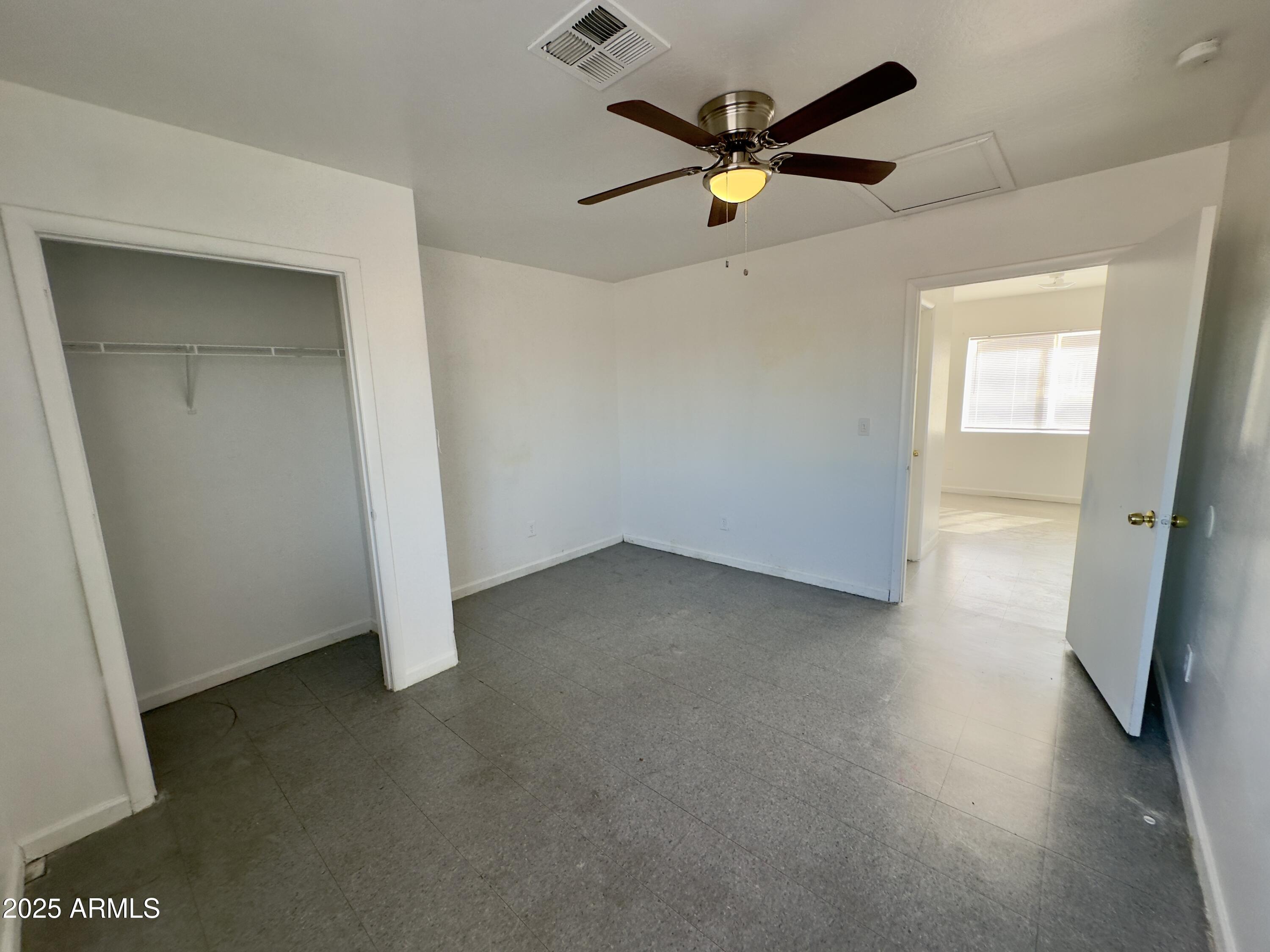 1224 East Apache Street, Unit 2 Phoenix, AZ 85034 - Photo 13 of 17 an empty room