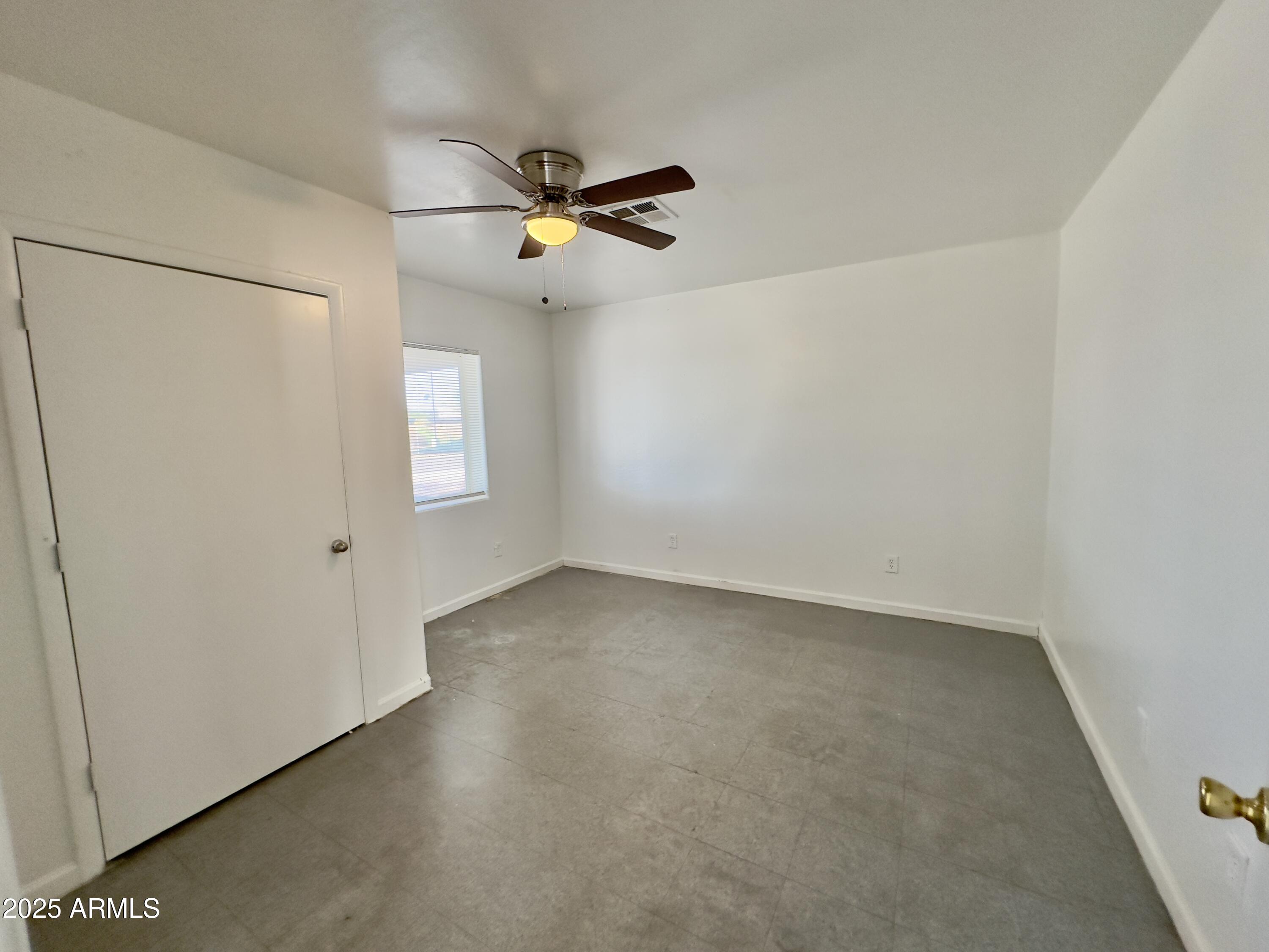 1224 East Apache Street, Unit 2 Phoenix, AZ 85034 - Photo 7 of 17 a view of an empty room