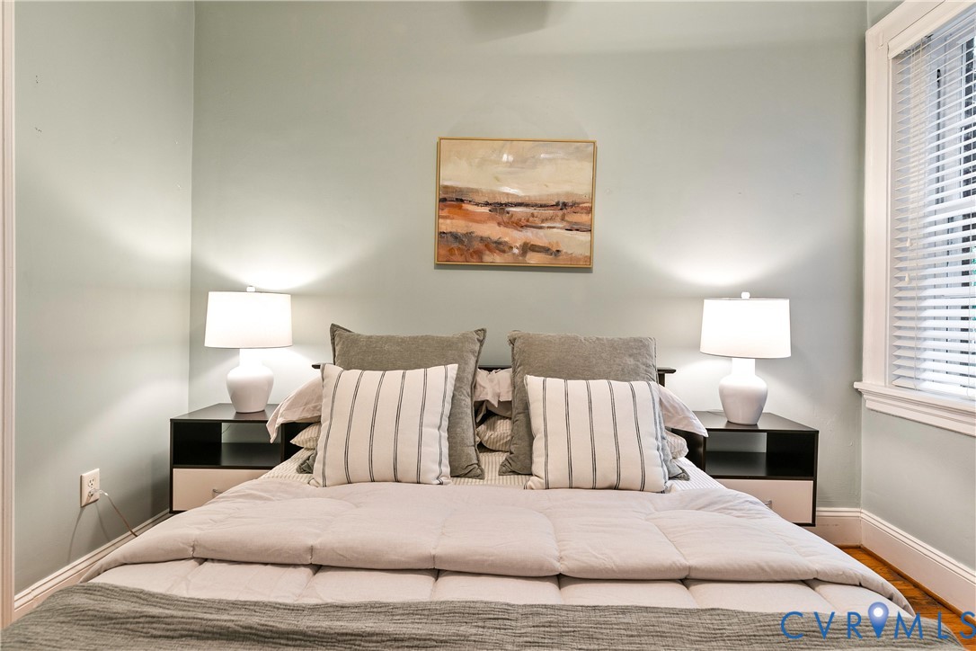 601 Roseneath Road, Unit U1 Richmond, VA 23221 - Photo 23 of 36 Bedroom featuring light wall color and wood-finish