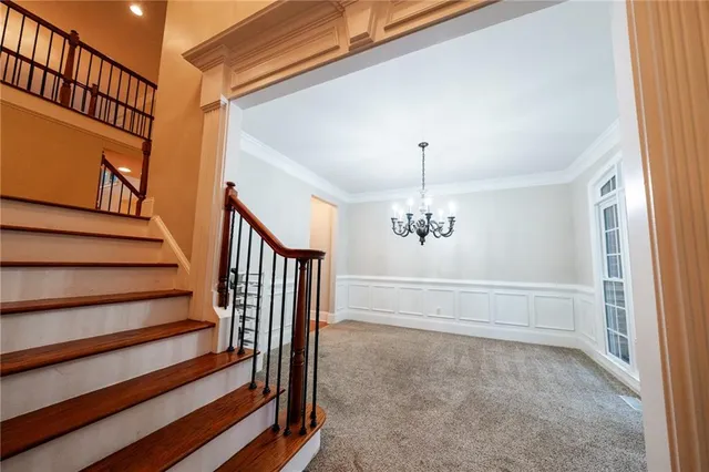 a view of entryway with wooden floor