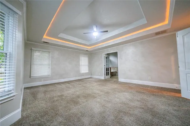 a spacious bathroom with a double vanity sink double and mirror