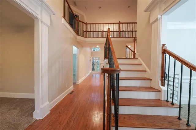 a view of entryway with wooden floor