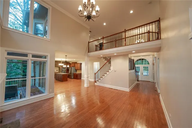 a view of livingroom with hardwood floor and a ceiling fan