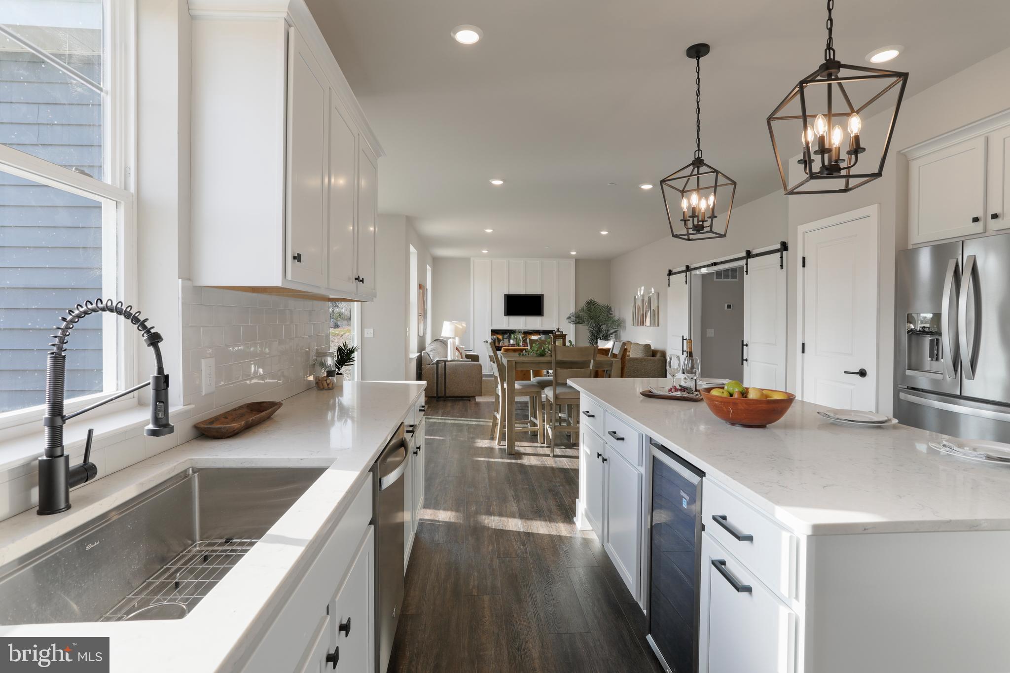 Ashton Road Clear Spring, MD 21722 - Photo 2 of 11 a kitchen with stainless steel appliances granite countertop a sink stove and refrigerator