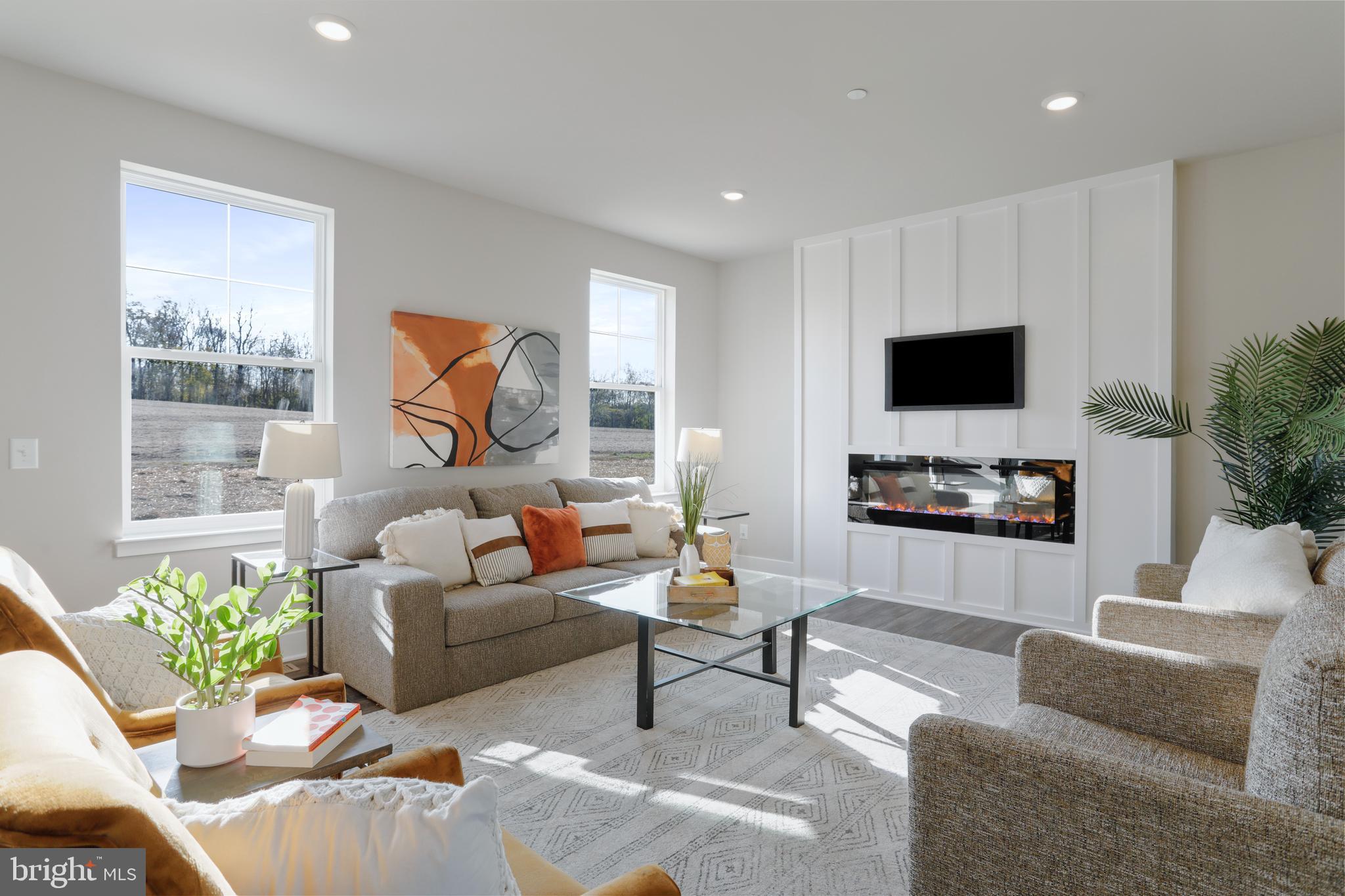 Ashton Road Clear Spring, MD 21722 - Photo 4 of 11 a living room with furniture and a flat screen tv