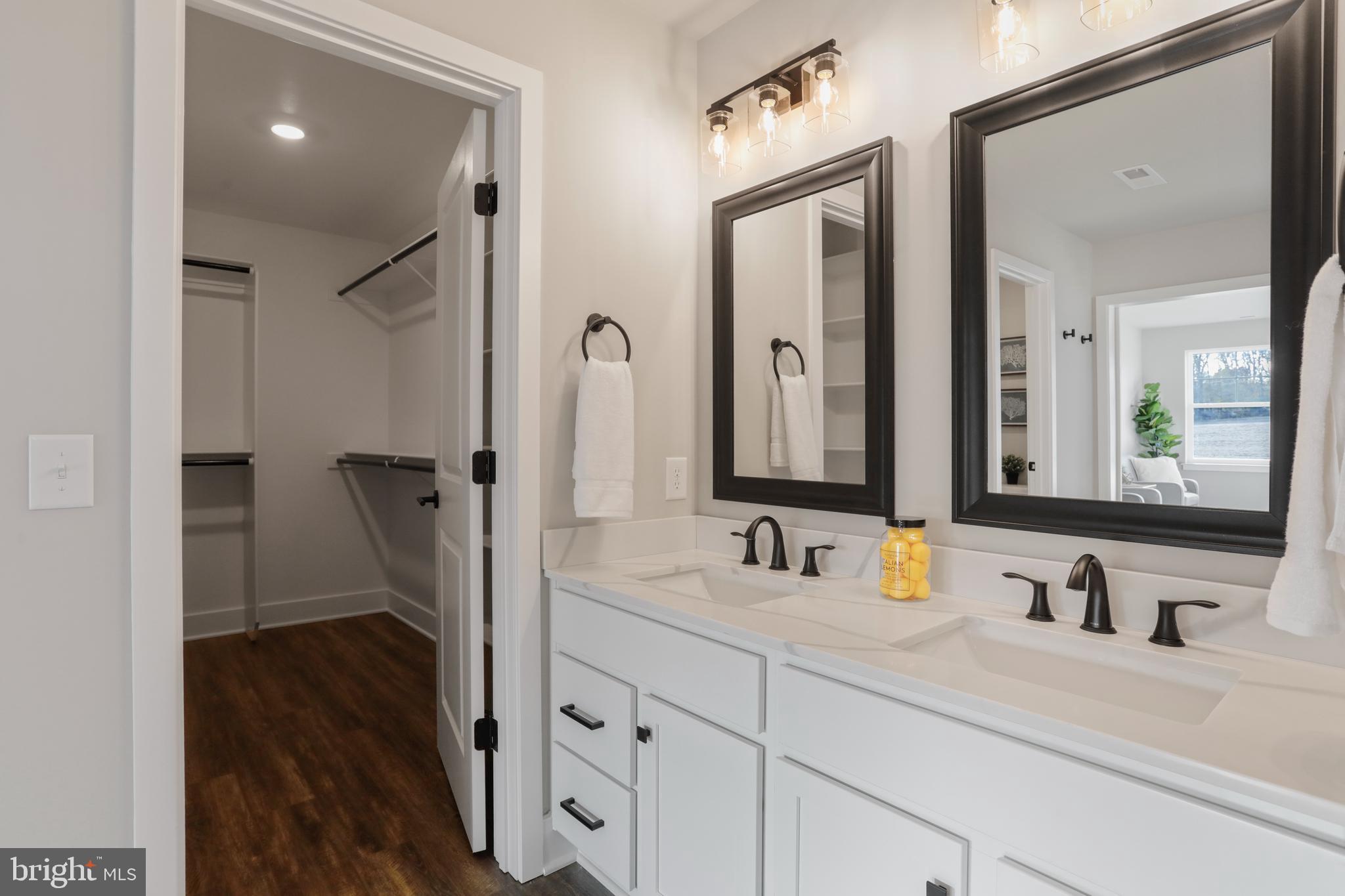 Ashton Road Clear Spring, MD 21722 - Photo 7 of 11 a bathroom with a double vanity sink mirror and