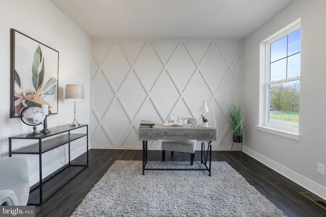 a view of a livingroom with furniture