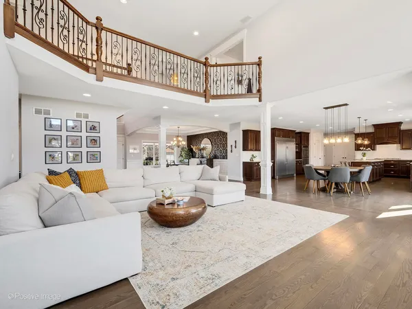 a living room with furniture and a table