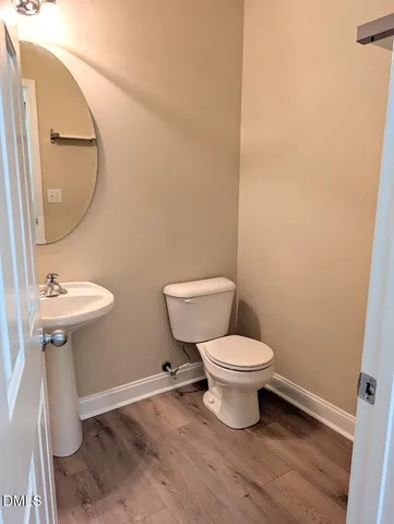 a bathroom with a toilet and a sink