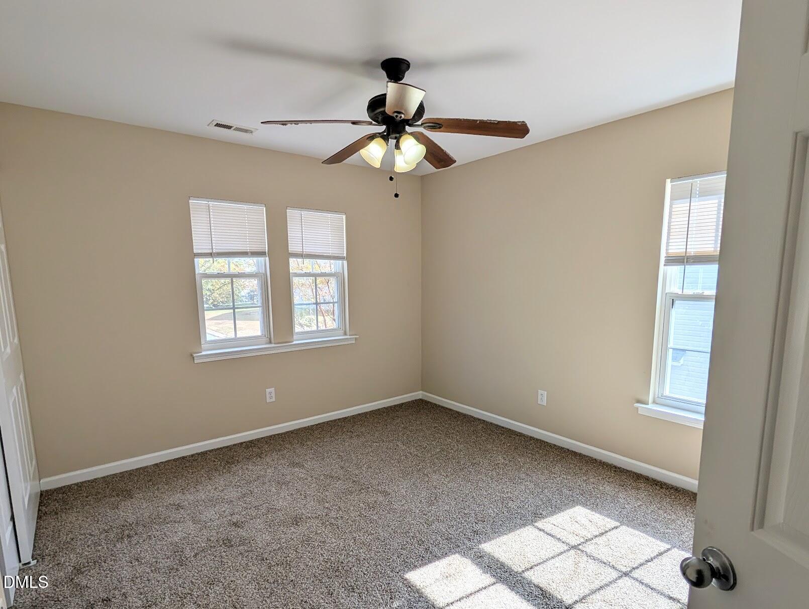 314 Ashburn Lane Durham, NC 27703 - Photo 35 of 40 a view of an empty room with a window