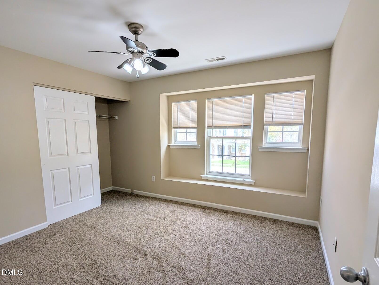 314 Ashburn Lane Durham, NC 27703 - Photo 37 of 40 a view of an empty room with a window