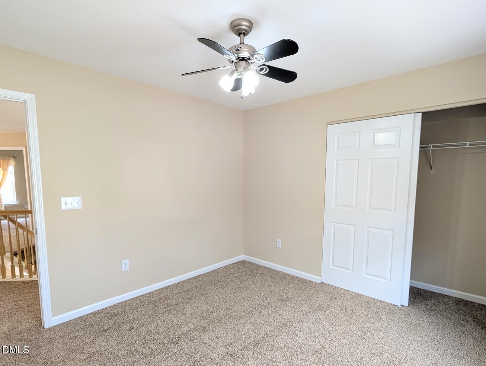 314 Ashburn Lane Durham, NC 27703 - Photo 38 of 40 an empty room with closet and windows