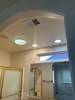 a view of a room that has a window in it