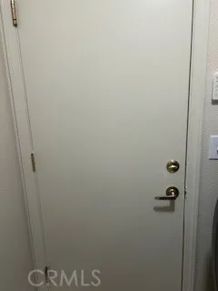 a kitchen with cabinets and window