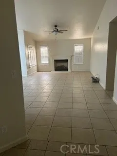 a kitchen with kitchen island a counter top space and stainless steel appliances