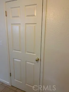 a view of storage and utility room with washer and dryer