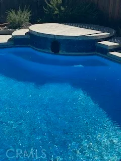 a white toilet sitting next to a window