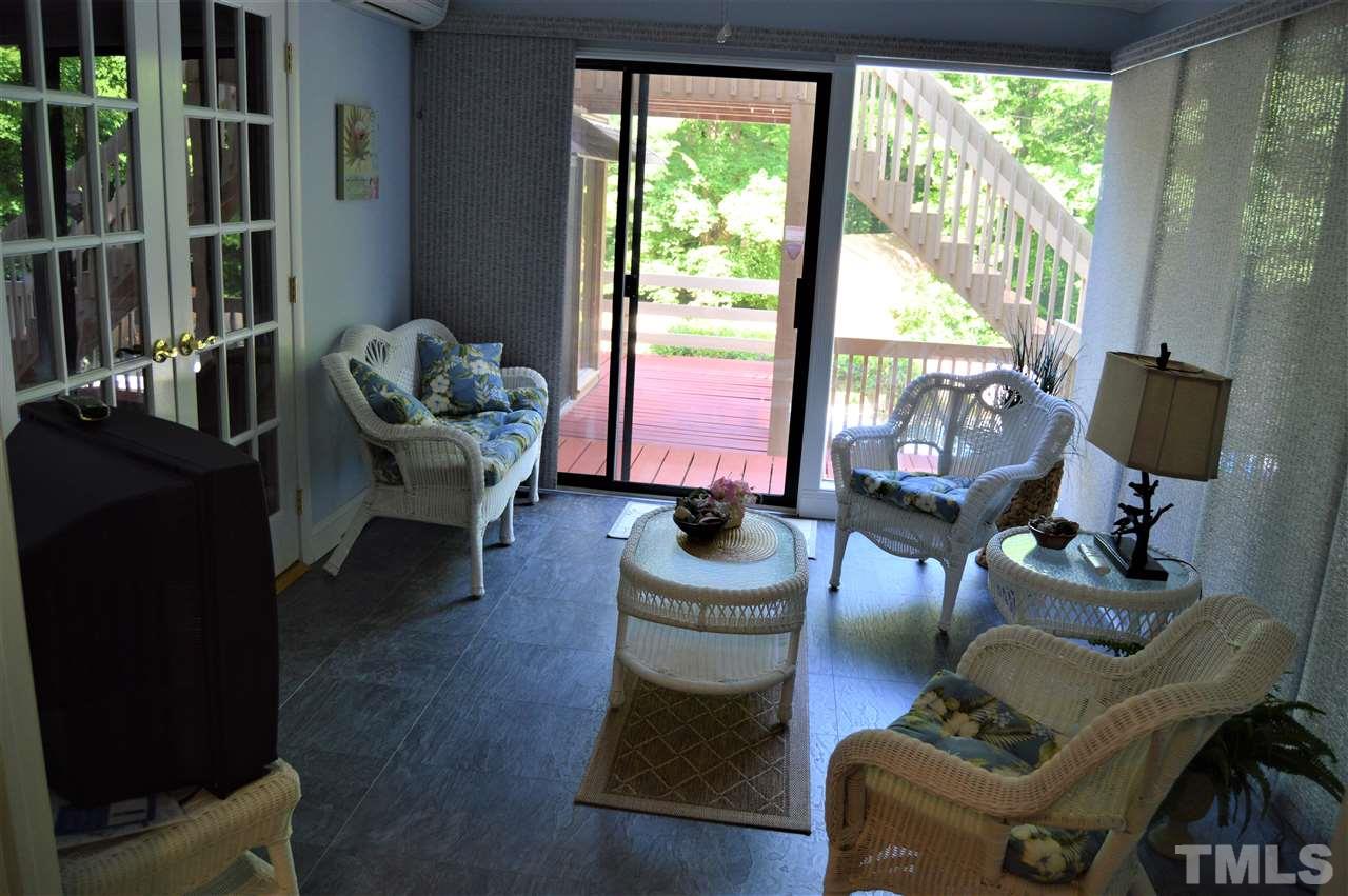 4120 Laurel Hills Road Raleigh, NC 27612 - Photo 8 of 25 screened in porch converted to sunroom. Note - sunroom was not permitted.