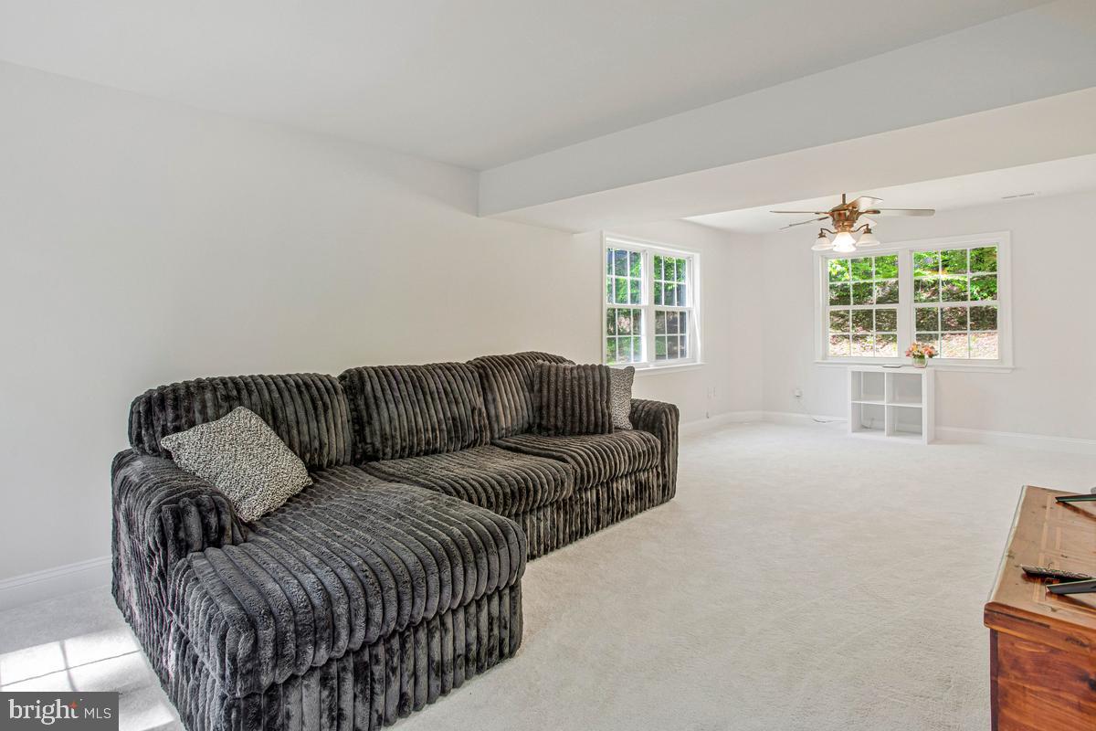 6098 Fir Road St. Leonard, MD 20685 - Photo 12 of 25 Spacious, sunlit living area awaits you.
