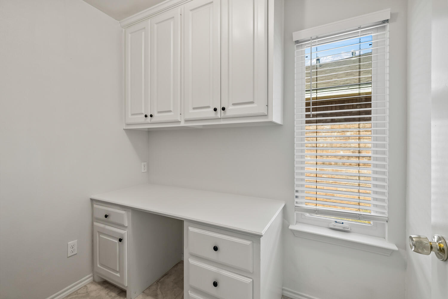 10508 Elgin Avenue Lubbock, TX 79423 - Photo 24 of 29 a view of an empty room with a window