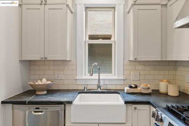 a bedroom with a bed and a lamp on table