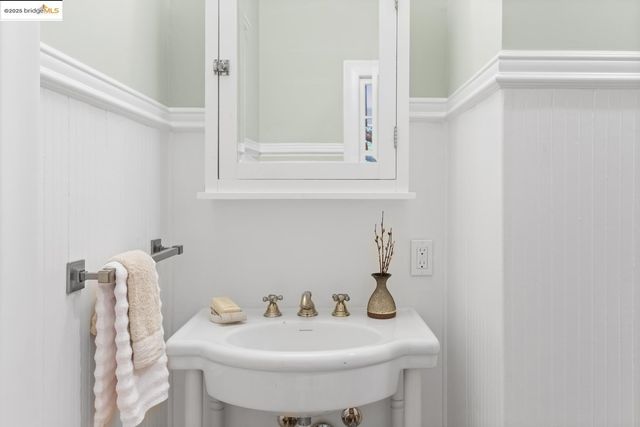 a living room with furniture a window and a table