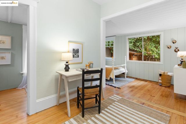 a view of a livingroom with furniture and window