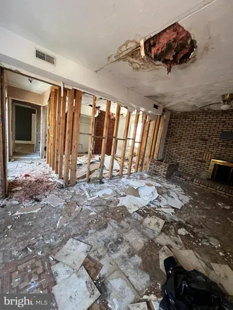 a view of an empty room and window