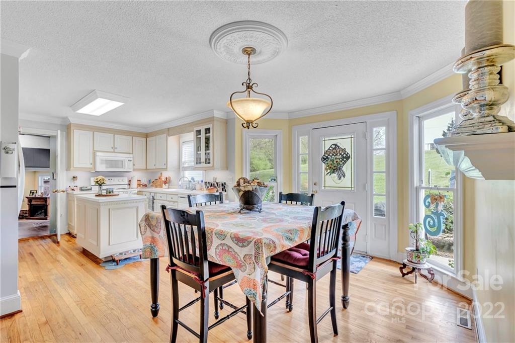 331 Polk Ford Road Stanfield, NC 28163 - Photo 25 of 47 a view of a dining room with furniture and window