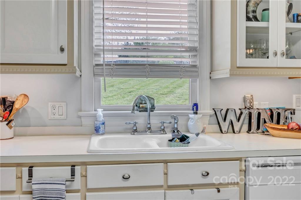 331 Polk Ford Road Stanfield, NC 28163 - Photo 29 of 47 a kitchen with a sink and large window