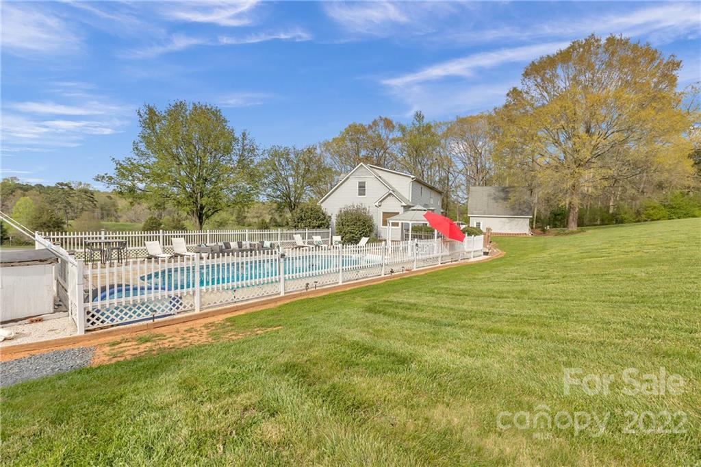 331 Polk Ford Road Stanfield, NC 28163 - Photo 5 of 47 a view of outdoor space and yard