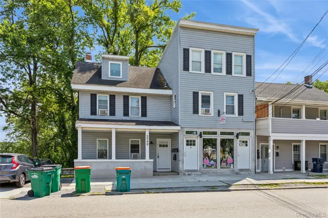 a front view of a building with street view
