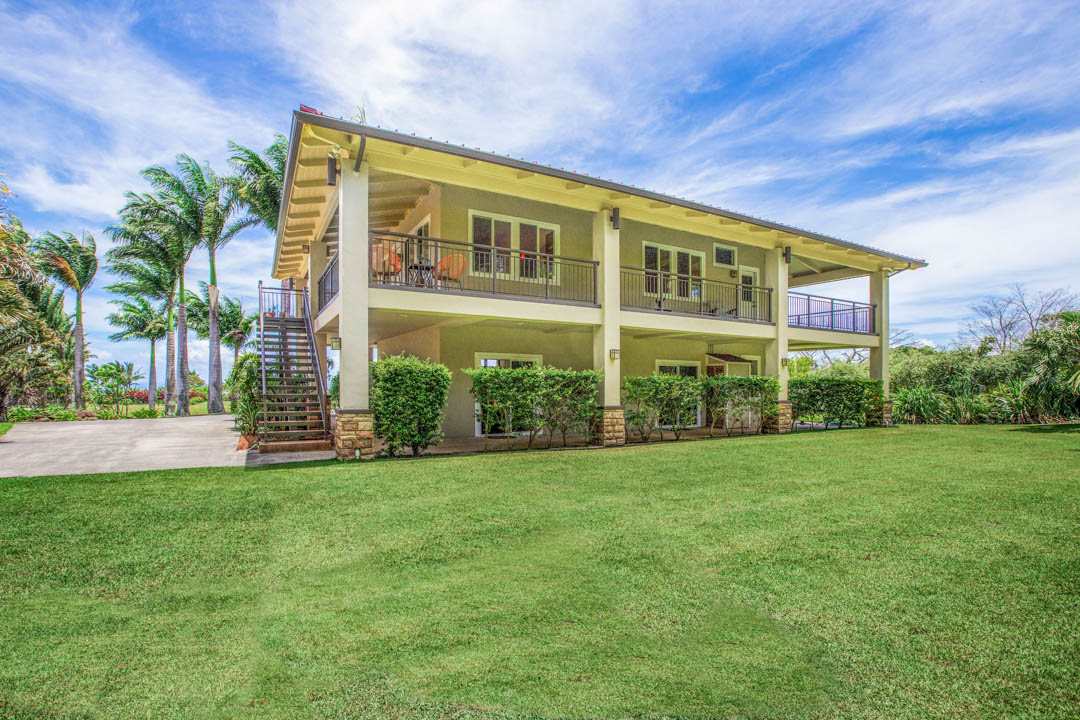405 East Kuiaha Road Haiku, HI 96708 - Photo 3 of 30 a front view of house with yard and green space