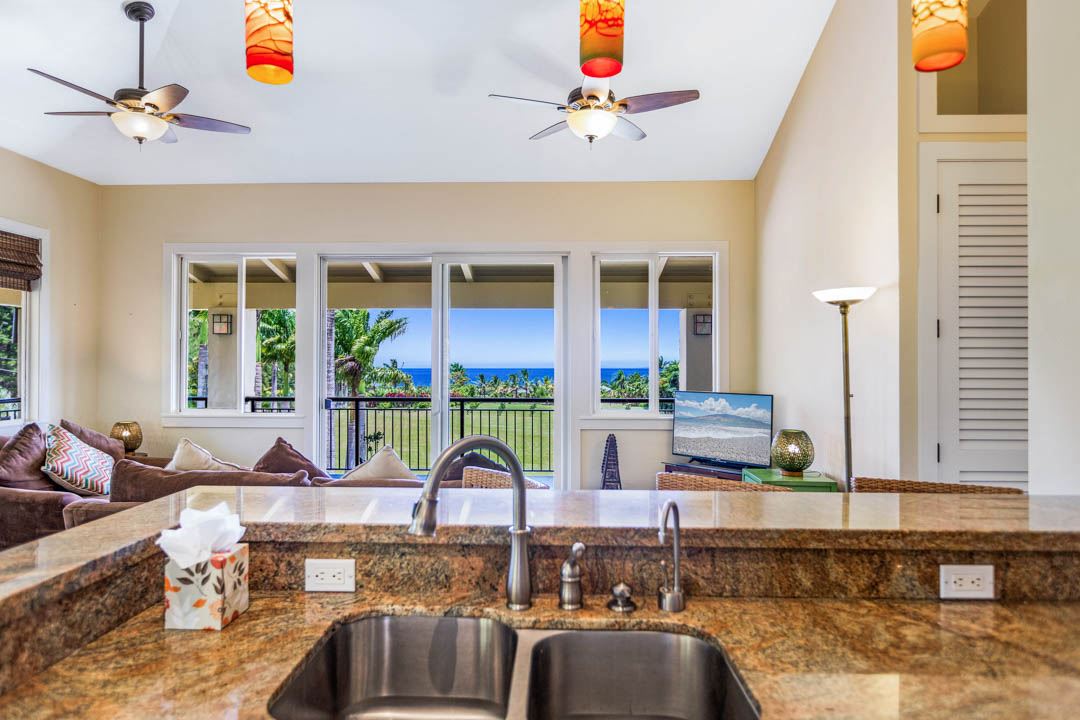 405 East Kuiaha Road Haiku, HI 96708 - Photo 9 of 30 a living room with fireplace furniture and a large window