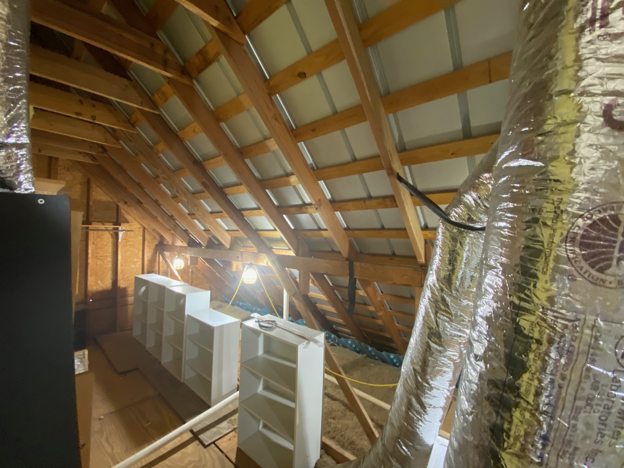 306 Plainview Road Wimberley, TX 78676 - Photo 29 of 29 An unfinished attic provides ample storage space or to create more living space.