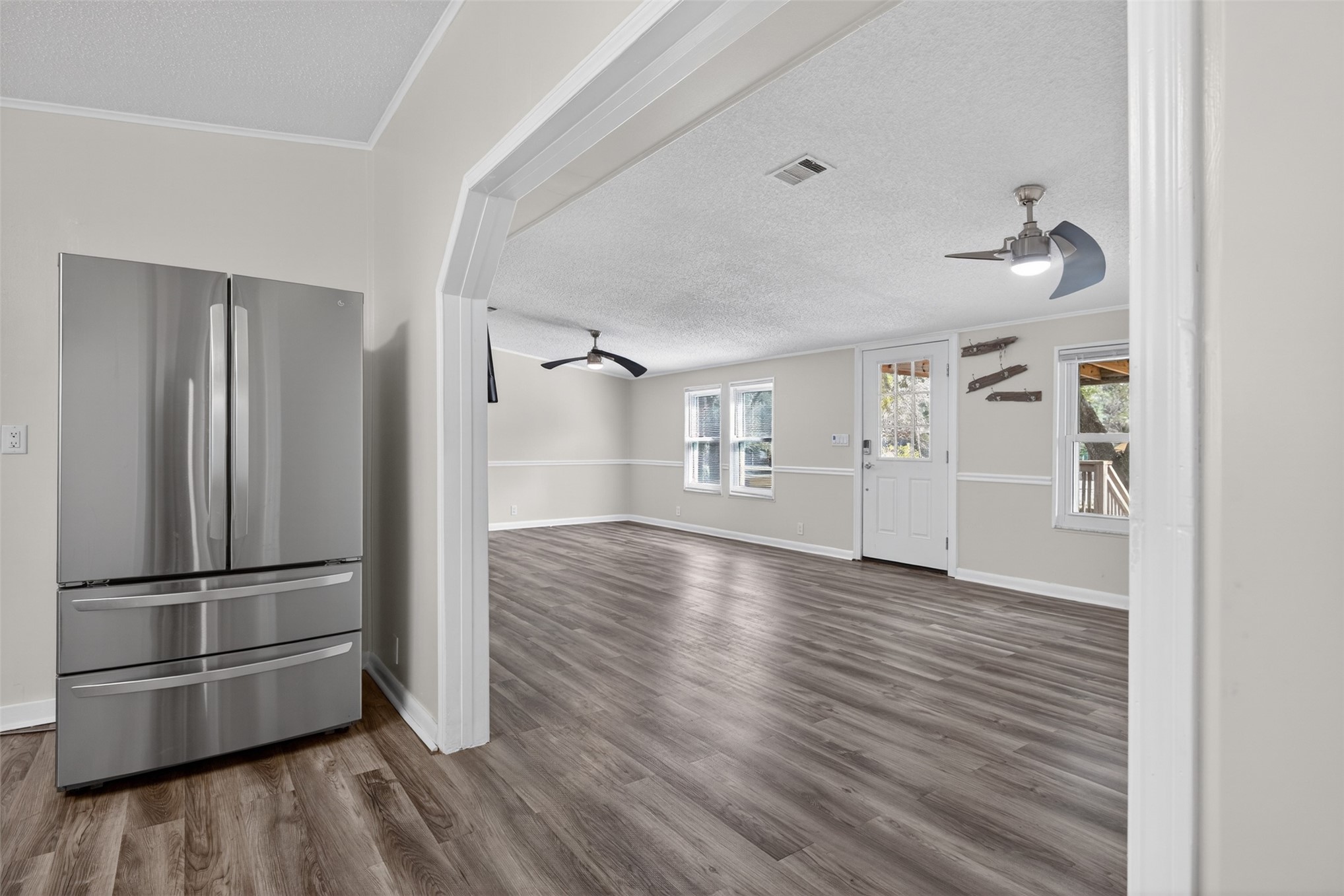 95021 Raintree Lane Fernandina Beach, FL 32034 - Photo 11 of 36 a view of empty room with wooden floor