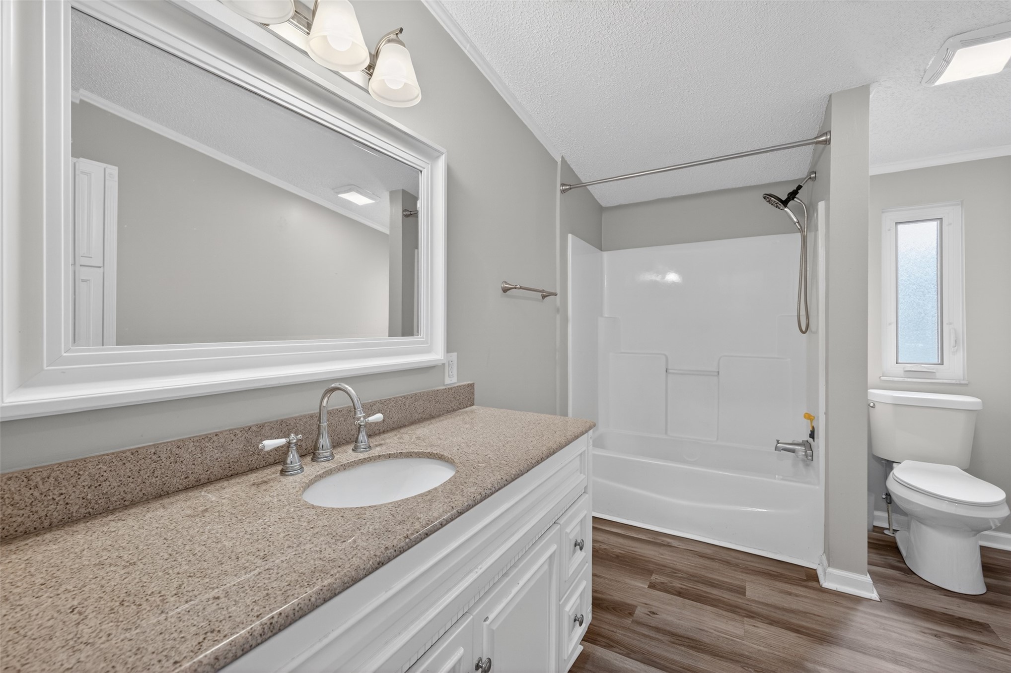 95021 Raintree Lane Fernandina Beach, FL 32034 - Photo 23 of 36 a bathroom with a granite countertop sink toilet and shower