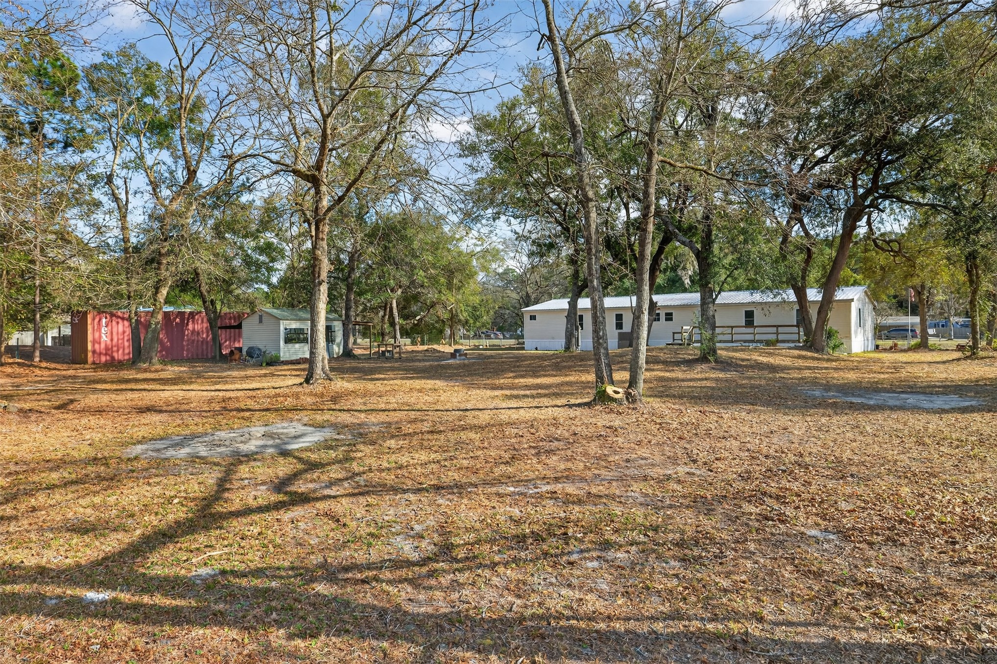 95021 Raintree Lane Fernandina Beach, FL 32034 - Photo 32 of 36 a house with trees in front of it