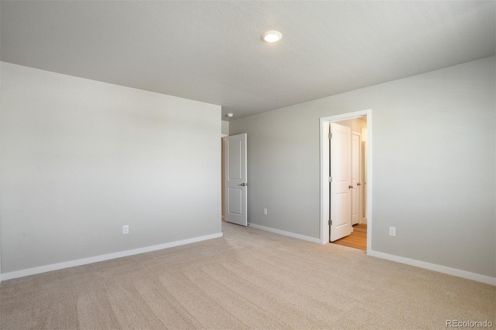 7416 Poudre Street Frederick, CO 80530 - Photo 10 of 30 a view of an empty room