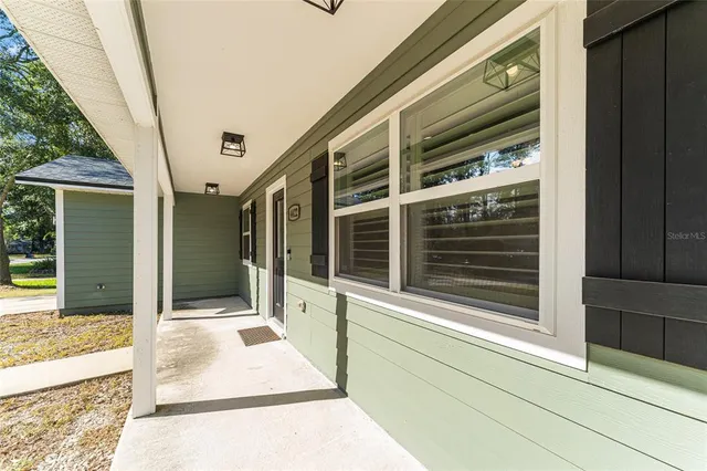 a view of a entryway door front of house