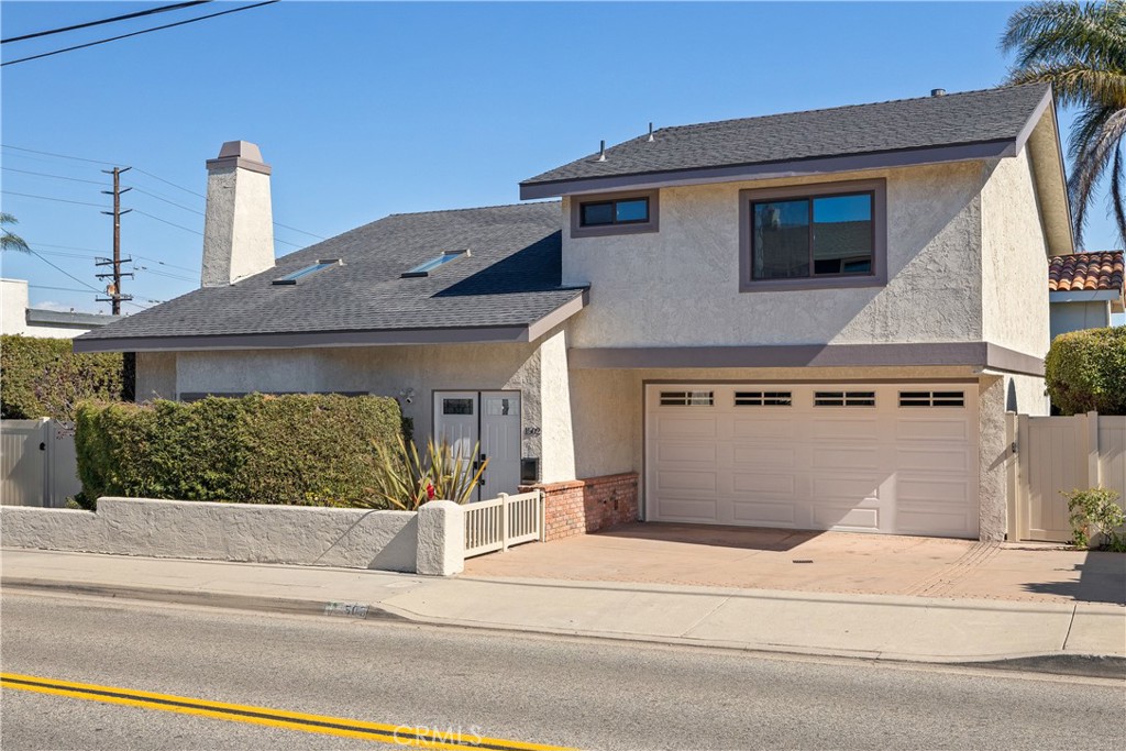 1502 Rindge Lane Redondo Beach, CA 90278 - Photo 1 of 1 a front view of a house with a garage