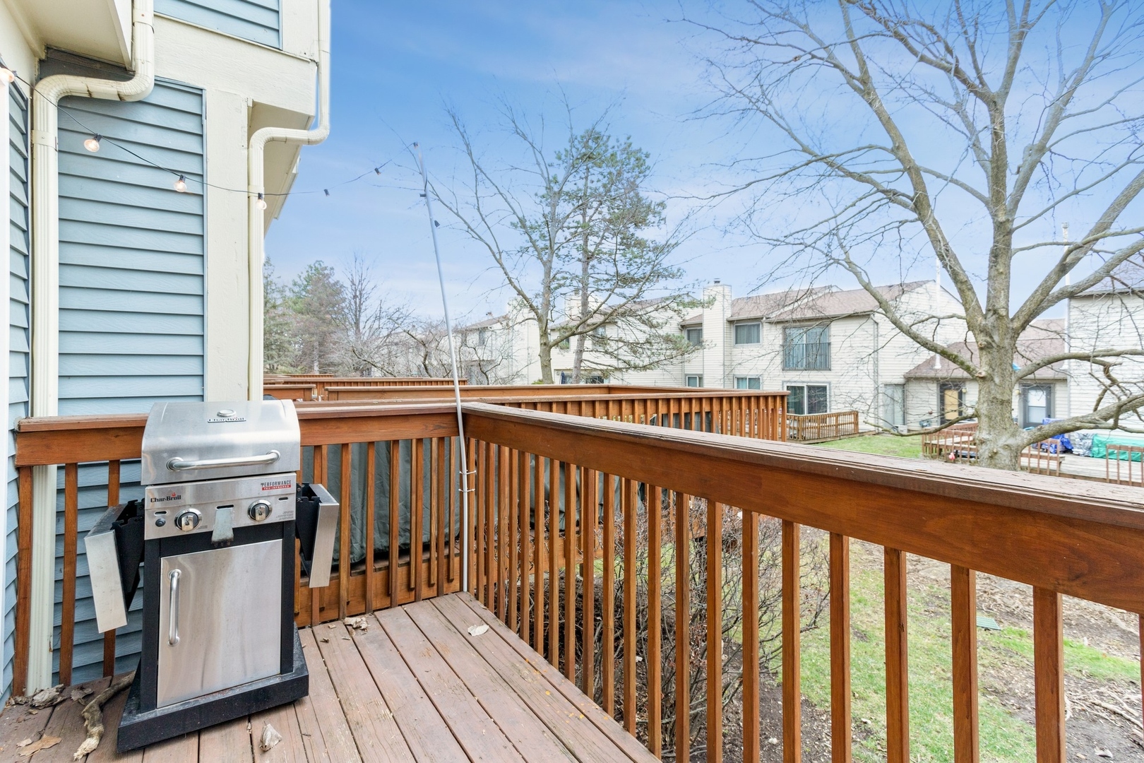 6367 Banburry Road, Unit 6367 Downers Grove, IL 60516 - Photo 17 of 20 a view of a street with wooden fence