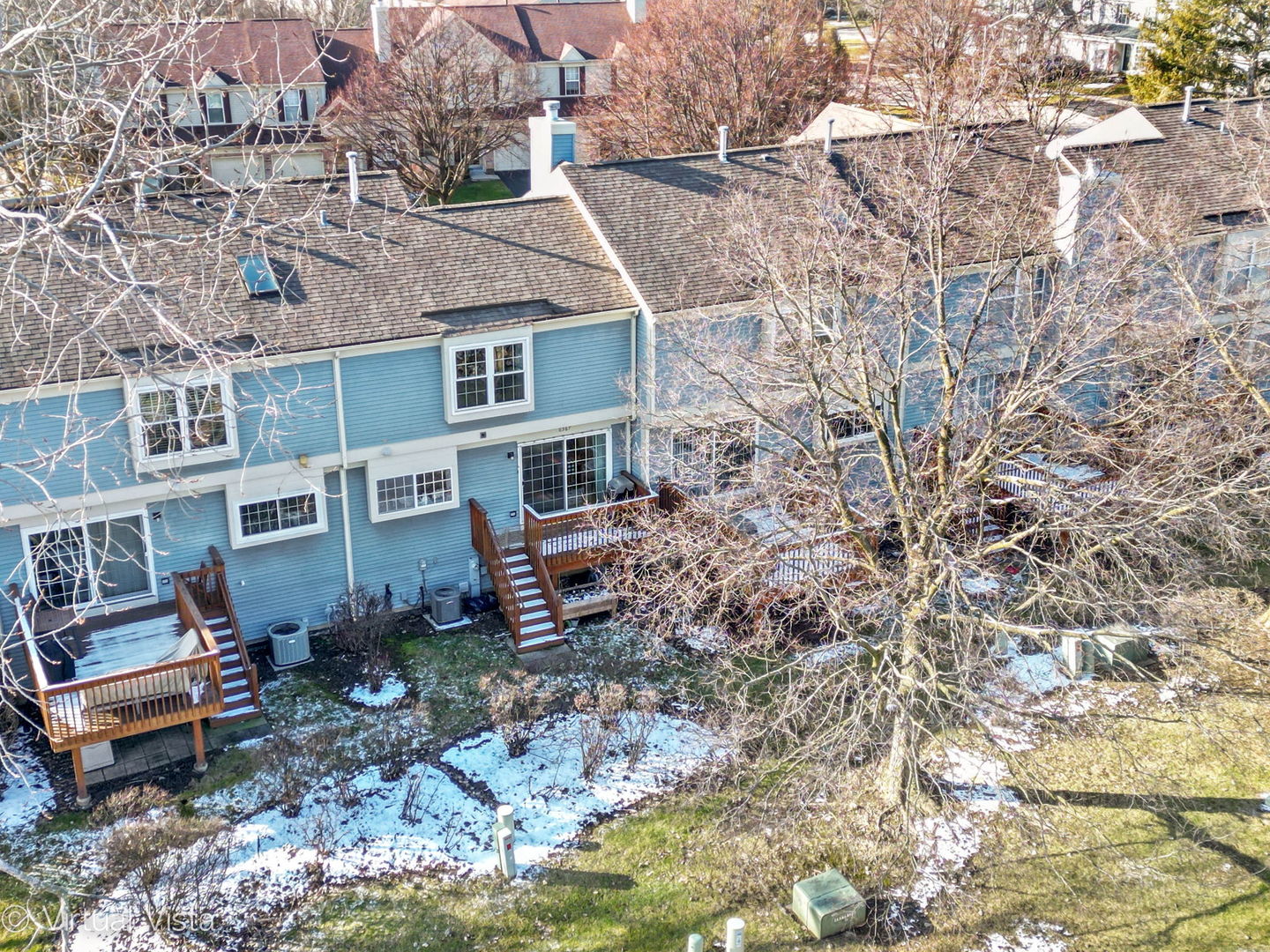6367 Banburry Road, Unit 6367 Downers Grove, IL 60516 - Photo 19 of 20 a view of a house with a yard