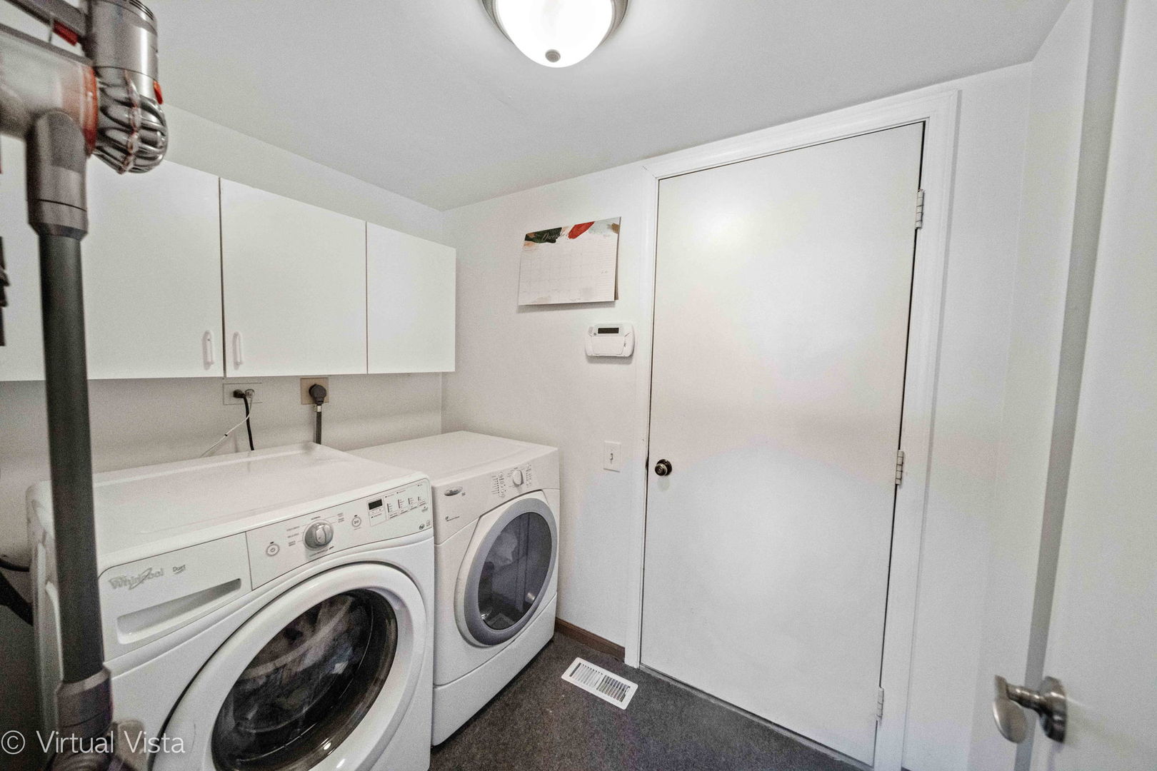 6367 Banburry Road, Unit 6367 Downers Grove, IL 60516 - Photo 9 of 20 a view of storage and utility room with washer and dryer