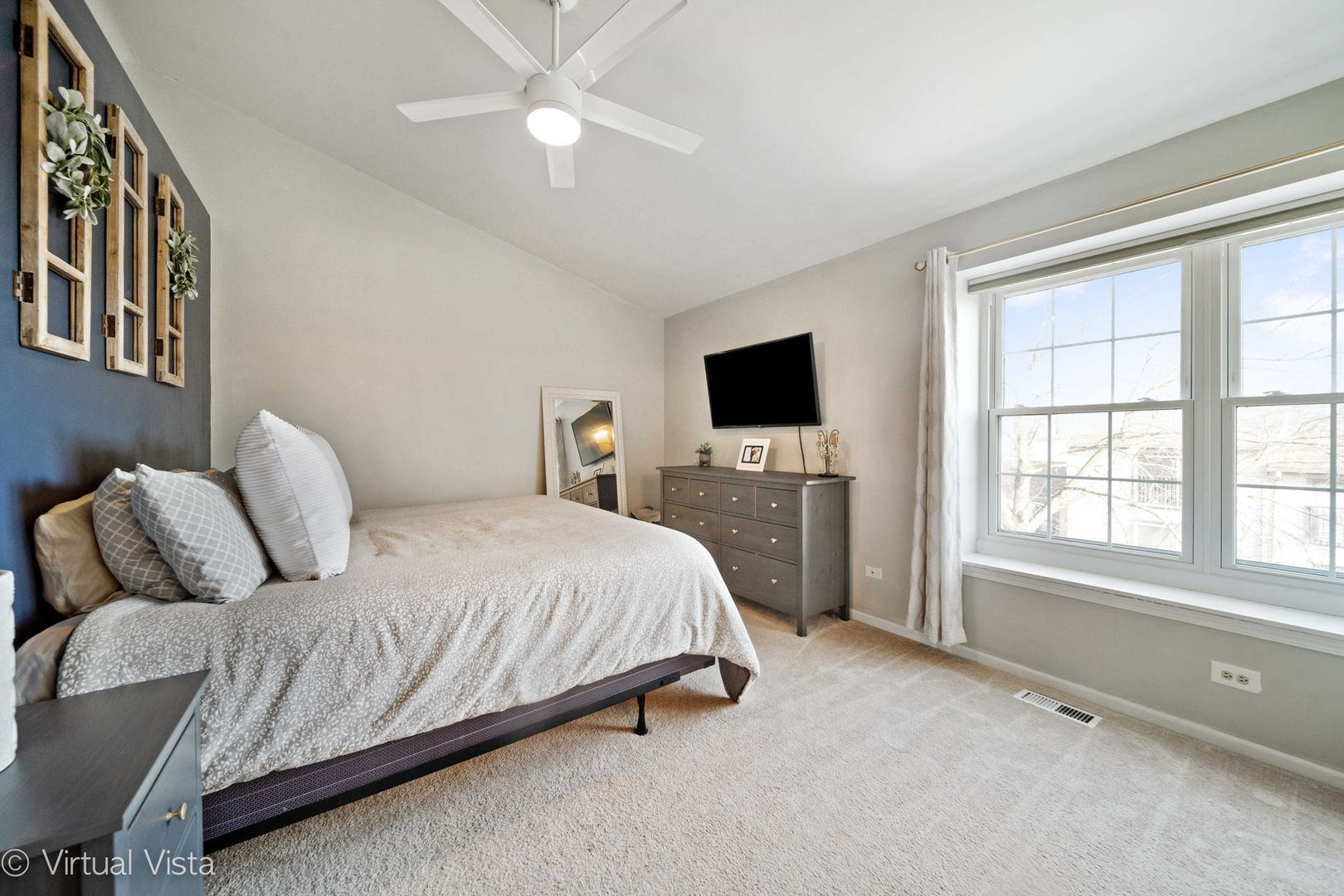 6367 Banburry Road, Unit 6367 Downers Grove, IL 60516 - Photo 10 of 20 a bedroom with a bed and a flat screen tv