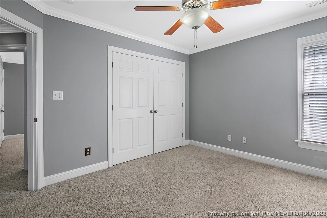 115 Blue Pine Drive Spring Lake, NC 28390 - Photo 35 of 48 a view of an empty room with a window