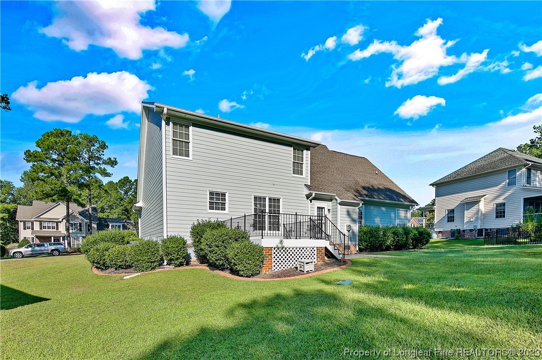 115 Blue Pine Drive Spring Lake, NC 28390 - Photo 38 of 48 a view of a house with a big yard