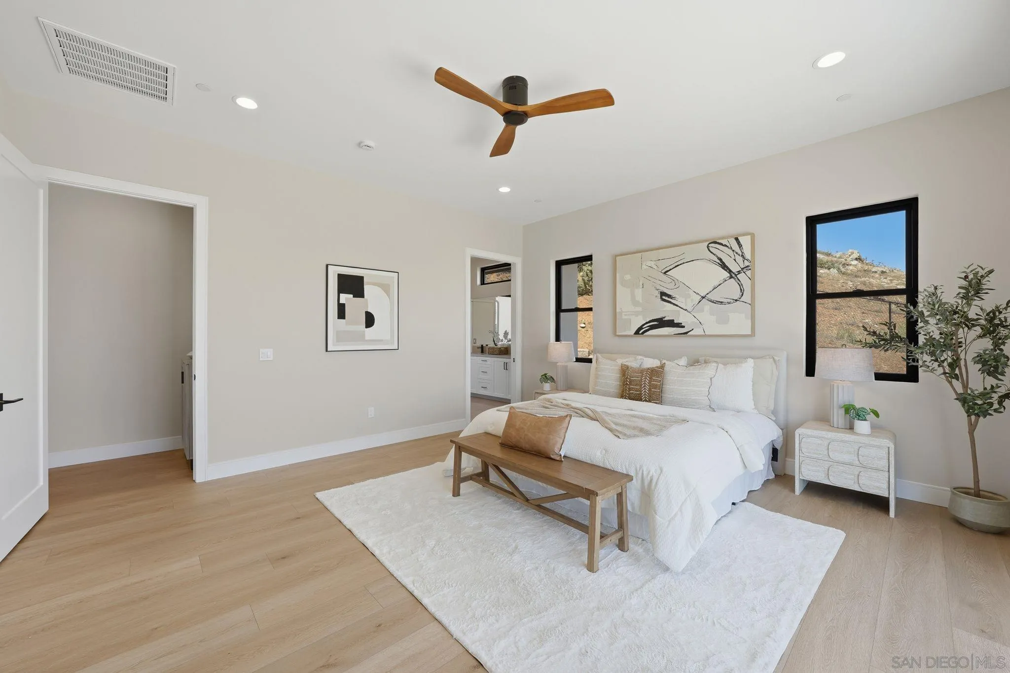 3916 Citrus Drive Fallbrook, CA 92028 - Photo 28 of 72 a bedroom with a bed and a large window
