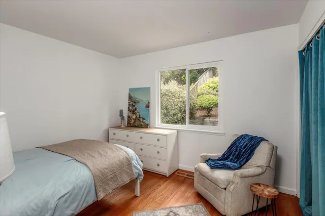 a bedroom with a bed and furniture