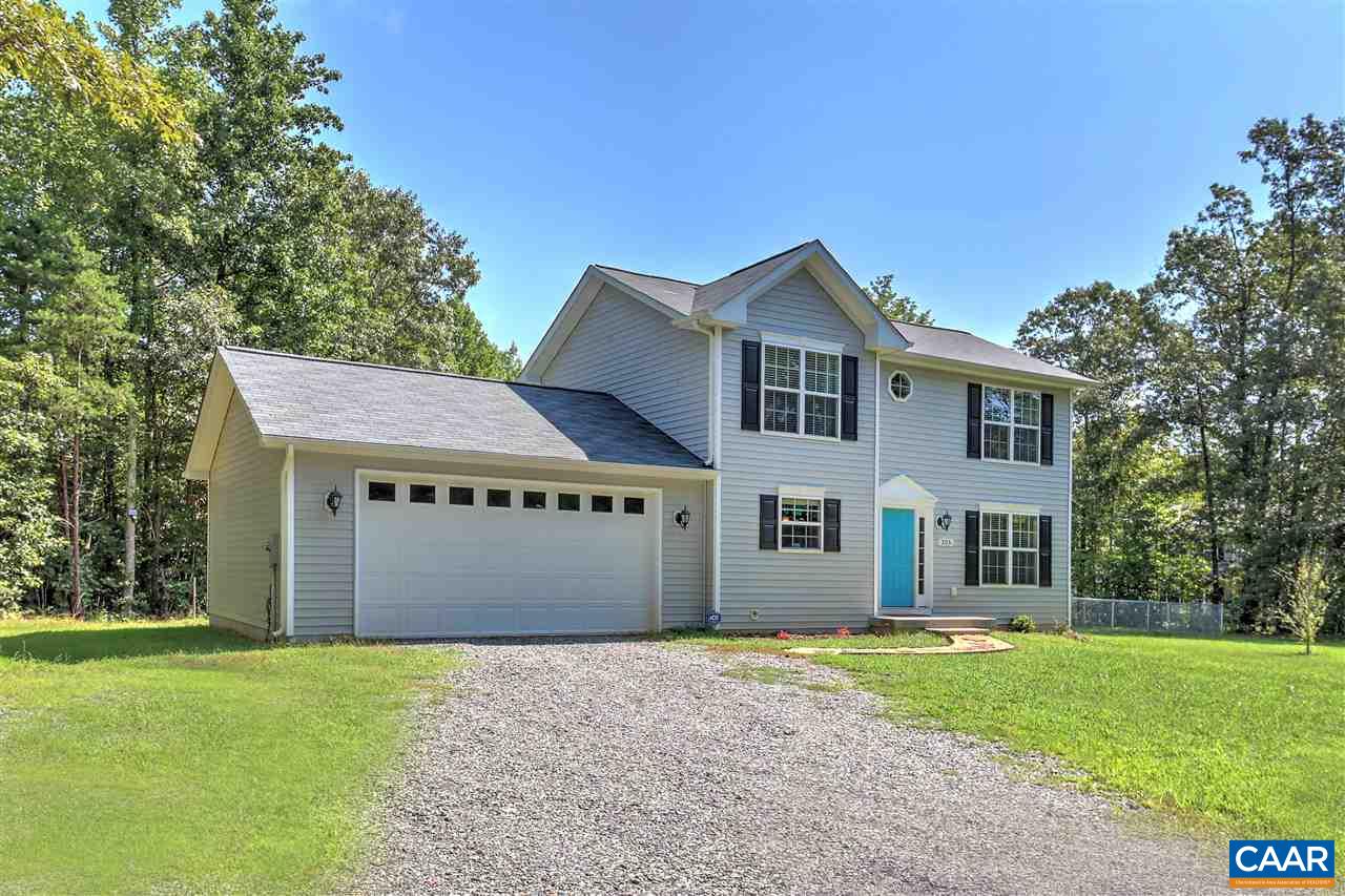 205 Jacoby Road Louisa, VA 23093 - Photo 1 of 21 a front view of a house with a garden